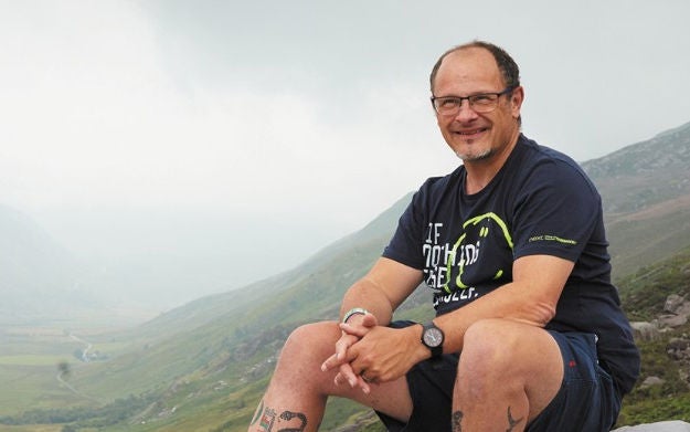 Man sitting in nature talks about the potential of DBS therapy