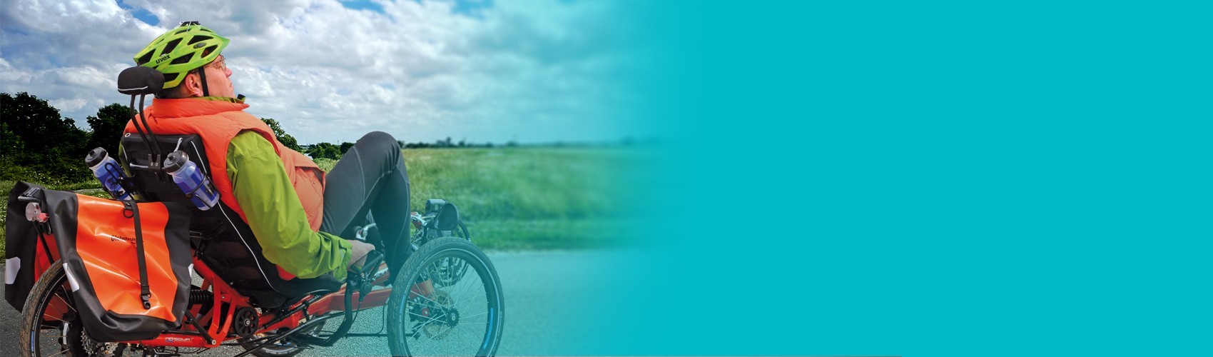 Elder man riding a recumbent bike