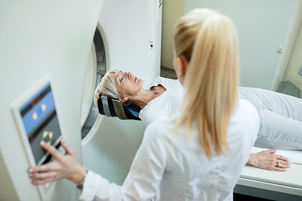 Elder woman at the MRI